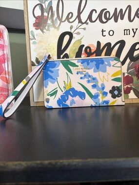 Kate SpadeFloral Wristlet Clutch in Blue, Green, Yellow, Pink